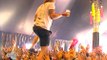 Singer Catches Beer While Crowdwalking