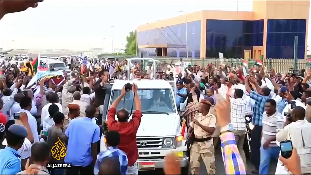 Bashir back in Sudan, fleeing arrest