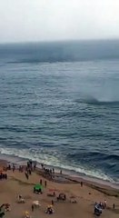 Storm at Beach - Watch live streaming.