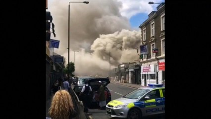 Fire engulfs shop in East London