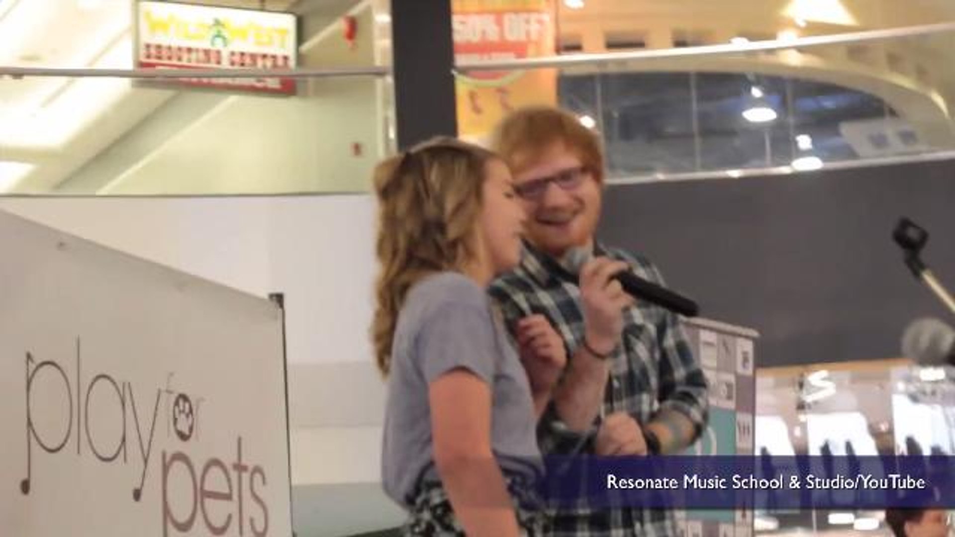 Ed Sheeran crashes girls performance of his song at the mall