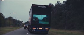 A screen on the back of a truck to see the road ahead