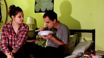 weird couple eating chinese food with chopsticks BACKWARDS