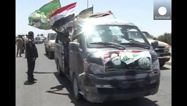 Iraqi refugees return home to Tikrit