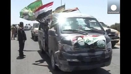 Iraqi refugees return home to Tikrit