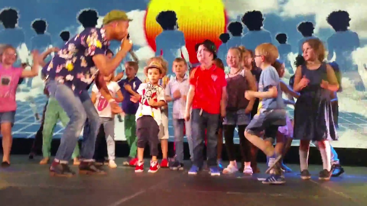 Kid dances alongside Pharrell Williams in a hilarious manner