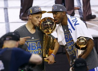 Andre Iguodala Receives 2015 Finals MVP Trophy