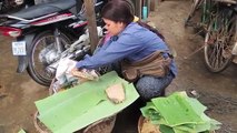 A Cambodian Bee Brood Vendor in Siem Reap