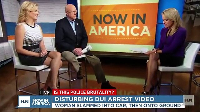 Shocking video: Cop slams woman into car