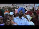 Devotees gather to pay obeisance at the Sikh shrine Golden Temple, Punjab