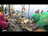 Chhat puja: Women perform rituals on the ghats of Yamuna in Delhi