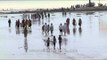 People walking at a beach in Alang, Gujarat