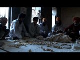 Sikhs doing sewa at Golden Temple, Punjab