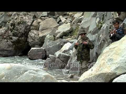 Indian angler tries hard to hook the elusive trout - Kashmir