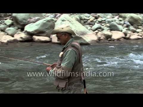 Anglers with fishing rod get down for fishing: Kashmir