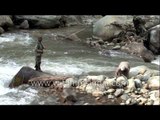 Casting afar for trout in Pahalgam stream, Kashmir