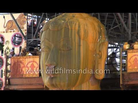 Bathing the world's largest monolithic statue in Turmeric or haldi!