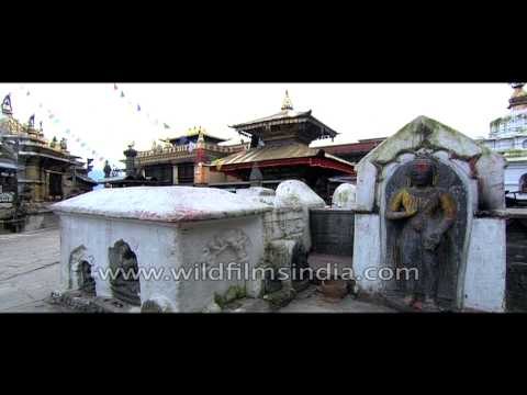 Spinning prayer wheels at Swayambhunath temple, Kathmandu