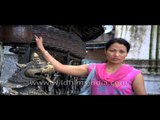 Devotees spinning prayer wheels at Swayambhunath temple - Kathmandu