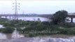 Delhi's Yamuna River floods over and breaches its banks