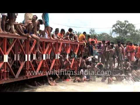 Kavarias take holy dip in river Ganges during Kavad Mela, Haridwar