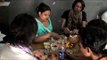 Indian transgender hijra lunches during a routine day of work