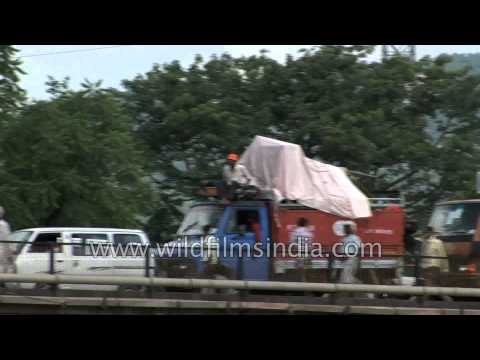 Kanwarias cross bridge during the Kavad Mela, Haridwar