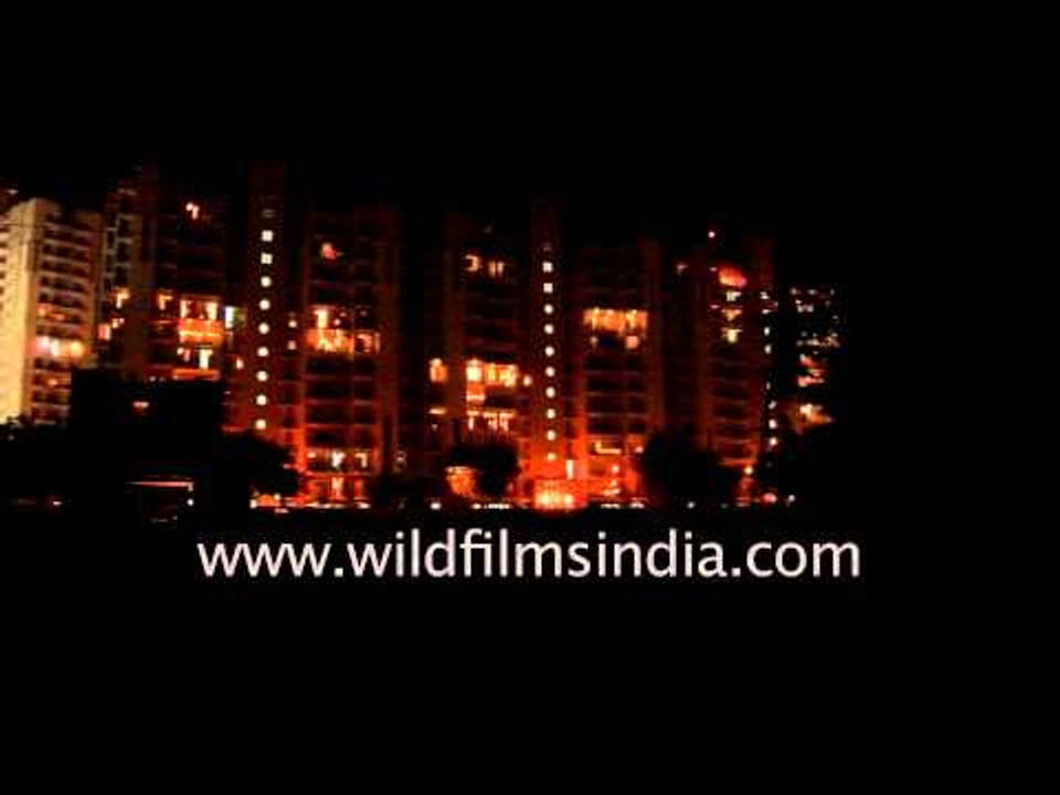 Shopping Malls & Apartments Decorated With Ligh...