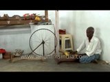 Spinning silk thread to make a saree in India