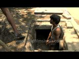 This is how we do it: cleaning a sewage drain in India