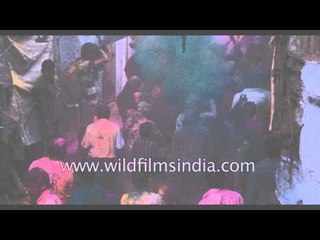Indian masses celebrate Holi in the streets of Mathura