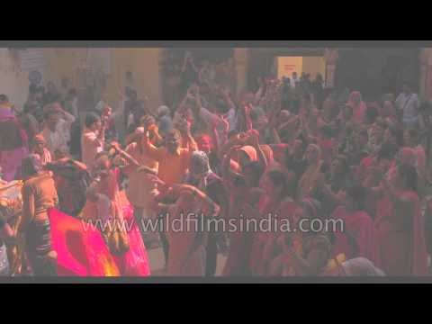 Indian revelers celebrate Holi - Radha Rani Temple, Nandgaon, Uttar Pradesh