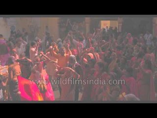 Indian revelers celebrate Holi - Radha Rani Temple, Nandgaon, Uttar Pradesh
