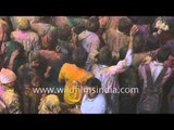 Hindus throw coloured powder at Banke Bihari Temple, Uttar Pradesh