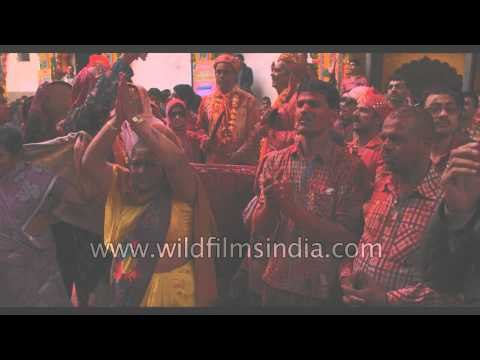 Hindu devotees celebrate Holi at Shri Dwarikadheesh Ji Mandir, Mathura