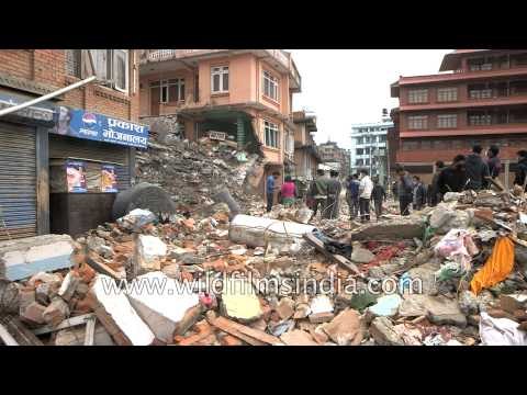 Street covered by debris from collapsed buildings - Kathmandu