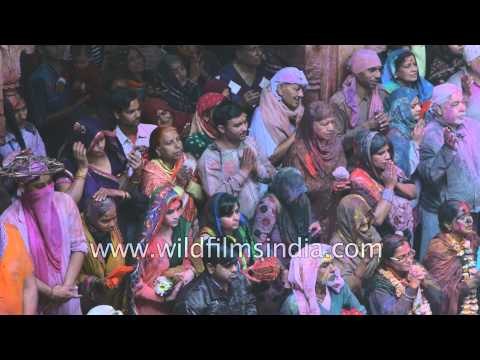 Hindus fold their hands in prayer, prior to Holi festive rituals