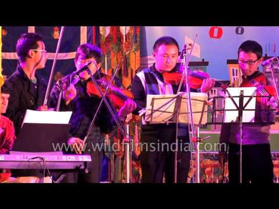 Mass violin by musical group from Sikkim at Winter Carnival