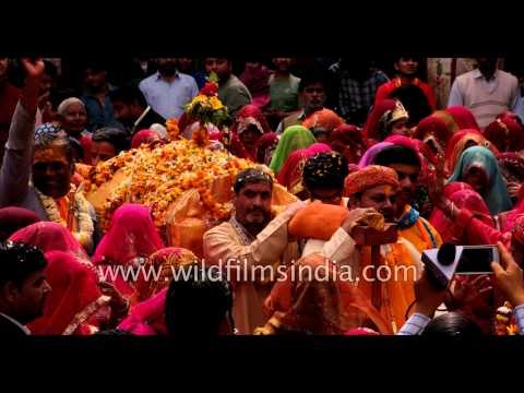 Hindu devotees join Holi procession in Gokul, Uttar Pradesh