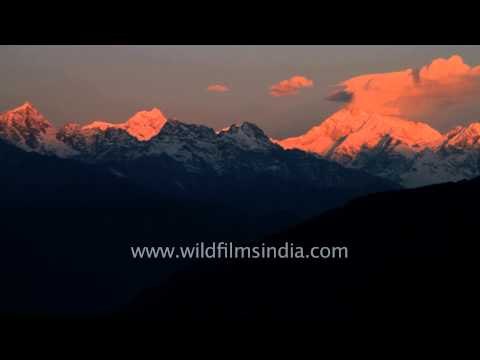 Clouds moving in fast motion over Kanchenjunga