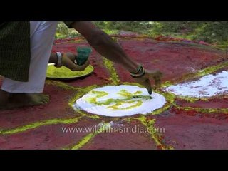 Indian men draw 'rangoli'  on the occasion of Holi Festival - Rishikesh