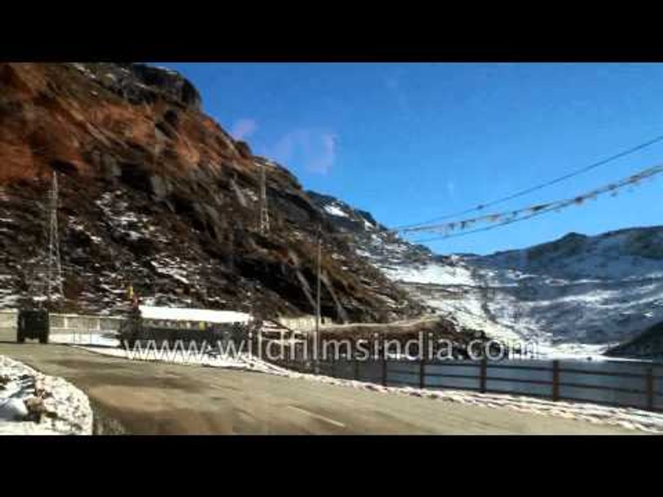 Driving through the snowy road towards the Nathula Pass
