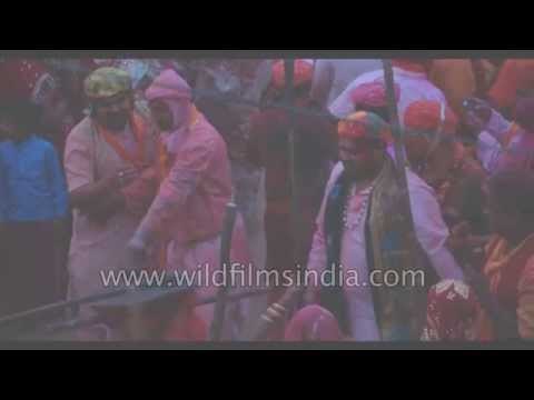 Women beat men during lathmaar holi in Barsana, Uttar Pradesh
