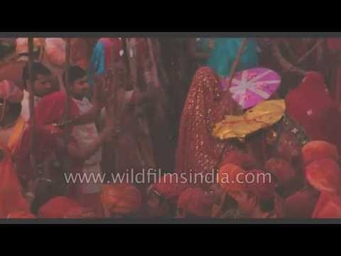 Women of Barsana beating men of Nandgaon - Lathmaar Holi, Uttar Pradesh