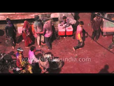 Vrindavan streets crowded with people smear in colours