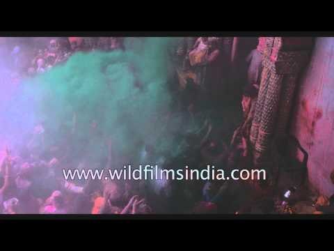 People smear colour on each other while celebrating Holi - Vrindavan