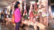 Women shop for prime cuts at meat market in Mizoram