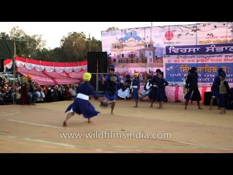 Sikh warriors demonstrate their 'gatka' skills in Punjab