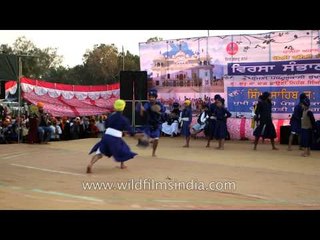 Sikh warriors demonstrate their 'gatka' skills in Punjab