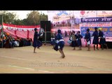 Sikhs mock fight it out at a Gatka martial art competition